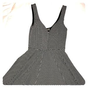 Black and white polka dot fit and flare dress
